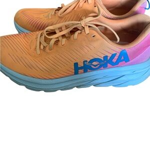 Hoka Orange and Blue Athletic Shoes with Maximalist Cushioning
